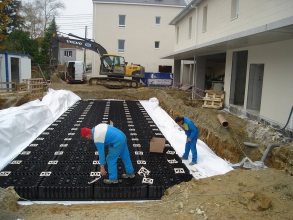 Ouvriers en train de terminer un chantier d'assainissement